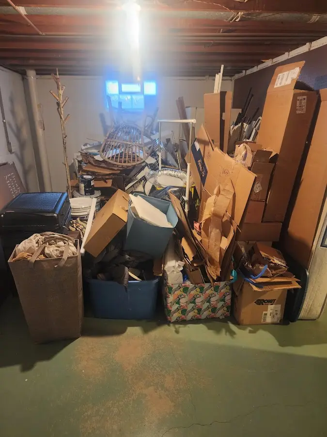 Roll-off dumpster container at job site for 6 Yard Dumpster Rental in Freeport